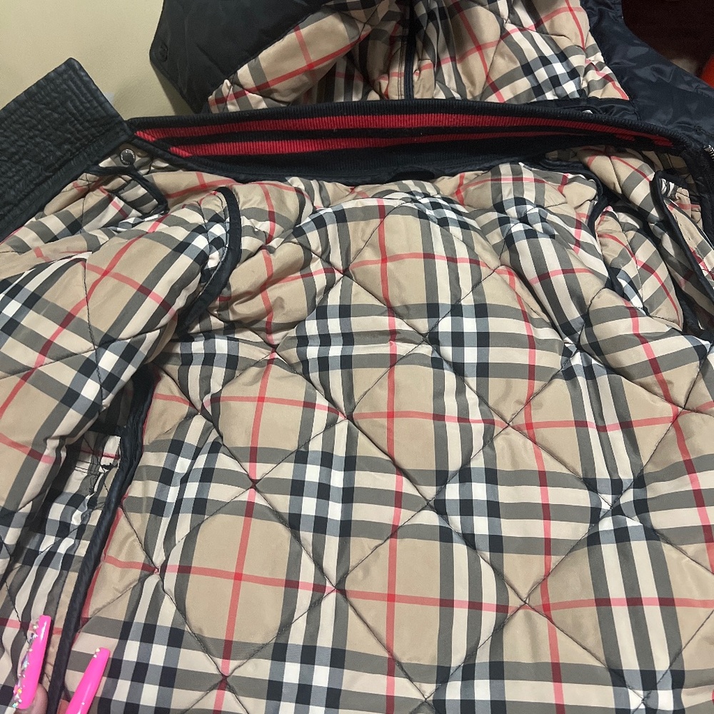 Burberry black jacket size 4 with hoodie you could take on nd off